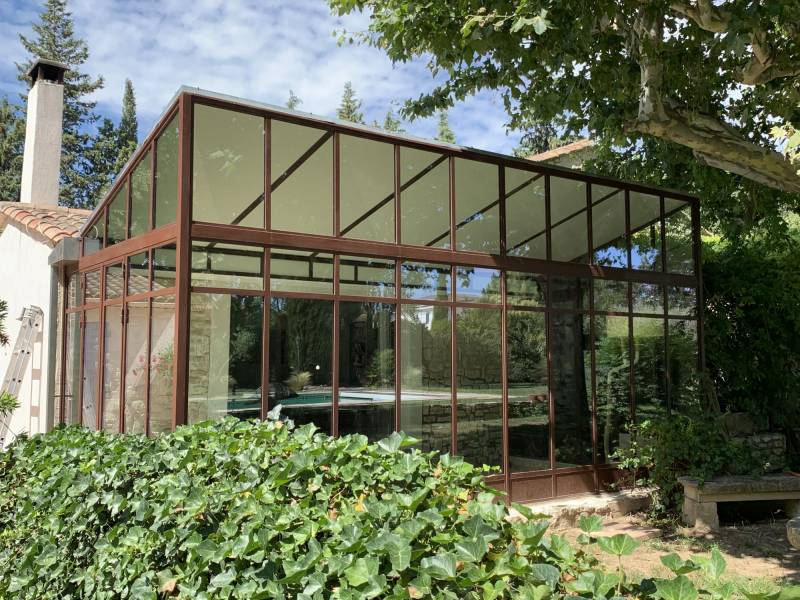 Installation d'une véranda sur mesure en bois et aluminium avec double vitrage à Trets